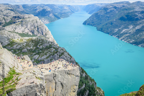 Aerial View of Preikestolen Pulpit Rock with Crowd and Turquoise Lysefjord from Upper Viewpoint, Norway