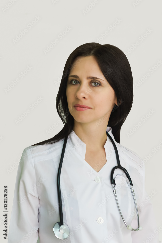 Portrait of young female doctor with a stethoscope. Portrait of young female doctor with a stethoscope.