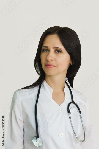 Portrait of young female doctor with a stethoscope.