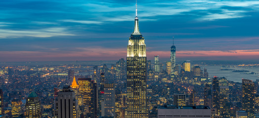 Wandcirkels Empire State Building Manhattan tijdens warme zonsondergang  © Elnur