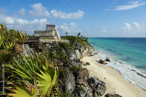 Tulum beach and El Castillo temple at ancient Mayan site of Tulum, Tulum, Quintana Roo, Mexico photo