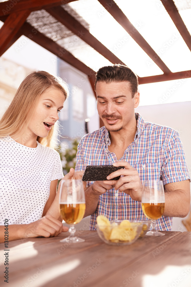 Blond looking at something on phone Blond looking at something on phone