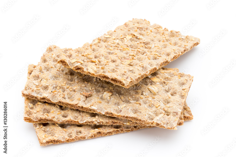 Stack of wholegrain crispy bread with sunflower, chia and sesame Stack of wholegrain crispy bread with sunflower, chia and sesame