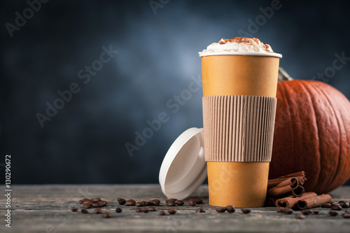 Fototapeta Naklejka Na Ścianę i Meble -  Pumpkin spice latte in a paper cup
