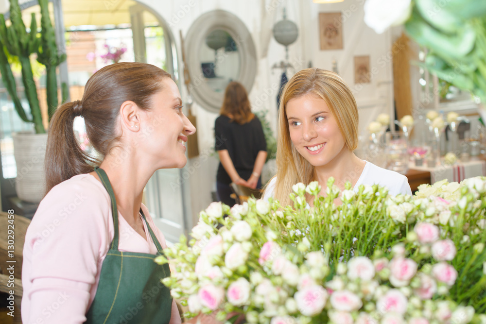 Florist interacting with customer