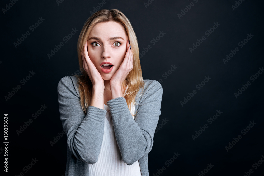 Pleasant young woman expressing wonder. Pleasant young woman expressing wonder.