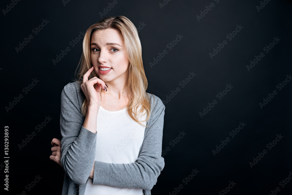 Pleasant young woman involved in thoughts Pleasant young woman involved in thoughts