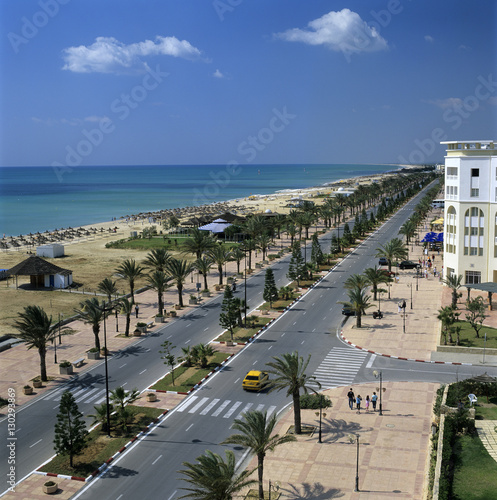View along beach front from roof of Lella Baya Hotel, Yasmine Hammamet, Cap Bon, Tunisia photo