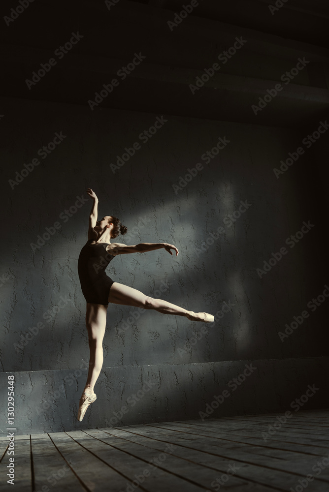 Masterful ballet dancer showing her abilities in the air Masterful ballet dancer showing her abilities in the air