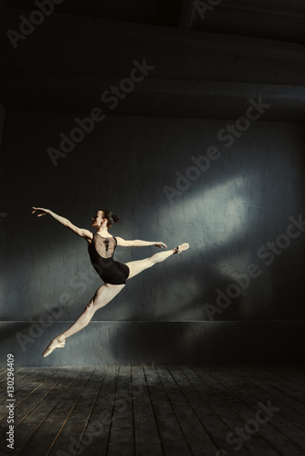 Graceful principal ballet dancer performing in the air