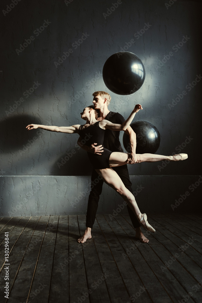 Young ballet dancers performing in the studio Young ballet dancers performing in the studio