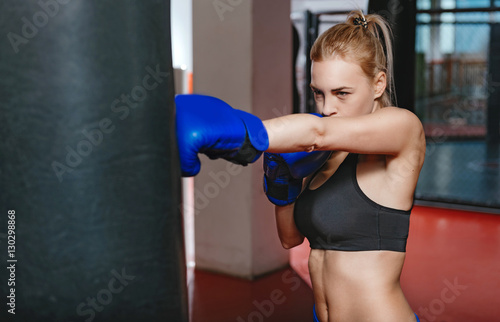 Beautiful strong girl working on her punch © Viacheslav Yakobchuk