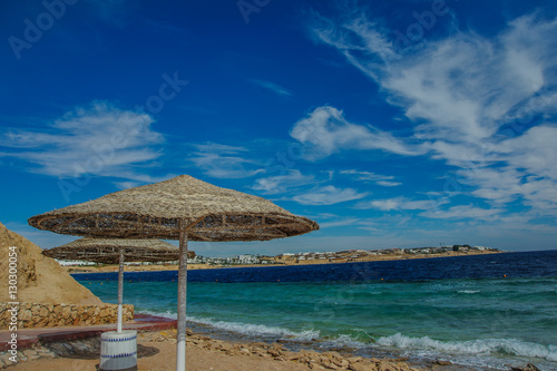 sunshade beach red sea blue sky beautiful view in tropical location © Med Photo Studio