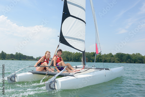 Couple on sailing vessel