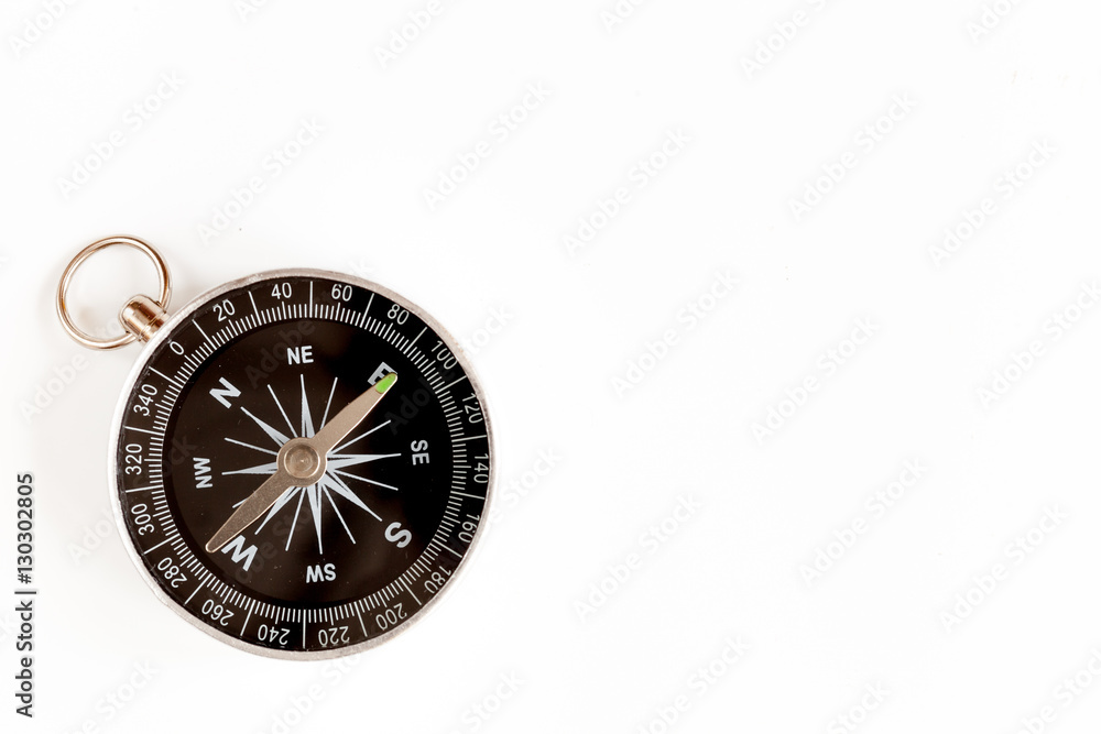 compass on white background concept - direction motion top view