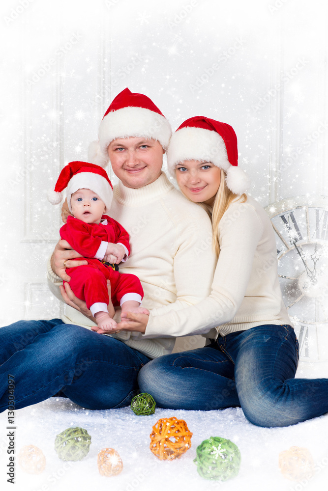 Happiness family in christmas hat on white background. Happiness family in christmas hat on white background.