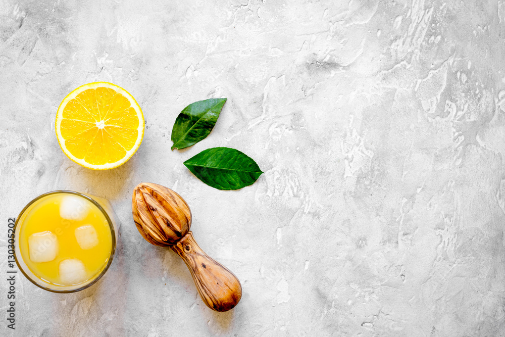 freshly squeezed orange juice on concrete background top view freshly squeezed orange juice on concrete background top view