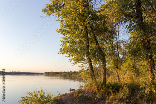 Fototapeta Naklejka Na Ścianę i Meble -  a beautiful sunset on the river
