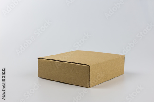 isolated yellow paper box on white background © zhu difeng