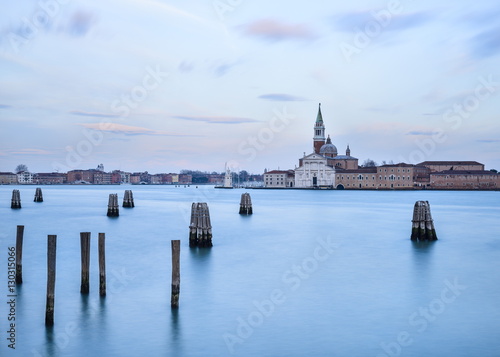 View from Zattere towards the Monastero di San Giorgio Maggiore at dusk, Venice, Veneto photo