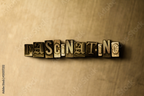 Fotografie FASCINATING - close-up of grungy vintage typeset word on metal backdrop