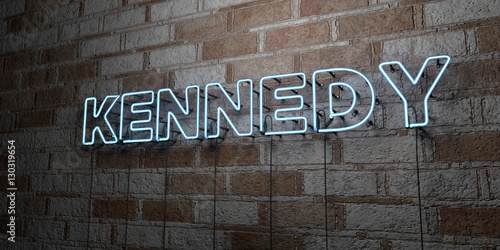 Cuadro en lienzo KENNEDY - Glowing Neon Sign on stonework wall - 3D rendered royalty free stock illustration