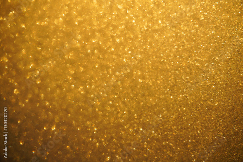 frost background on window with golden sunlight