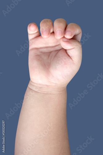 Hand of baby isolated on blue background with clipping path © CasanoWa Stutio