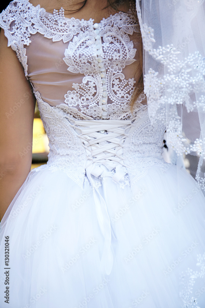 Bride in beautiful wedding dress, close up