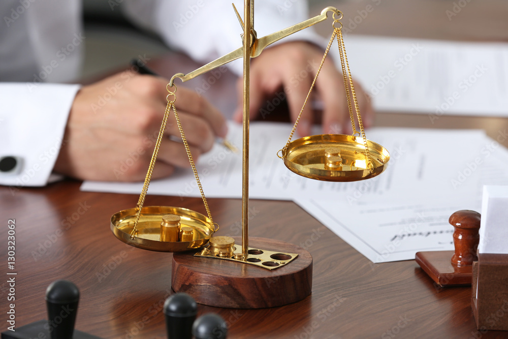 Fotografie Scales on notary public table, concept