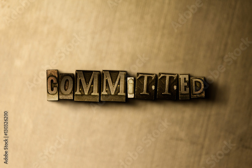COMMITTED - close-up of grungy vintage typeset word on metal backdrop. Royalty free stock illustration.  Can be used for online banner ads and direct mail.