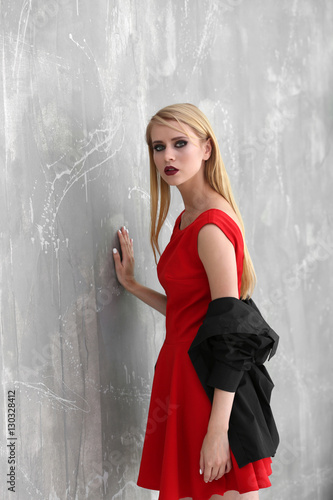 Pretty young blonde woman a...