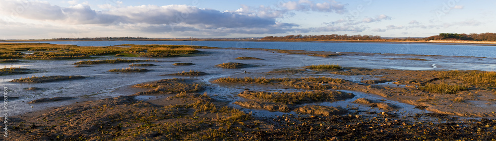 The image of the world is represented in the shape of the creak weaving around the marshy edges of Chichester Harbour, West Sussex The image of the world is represented in the shape of the creak weaving around the marshy edges of Chichester Harbour, West Sussex