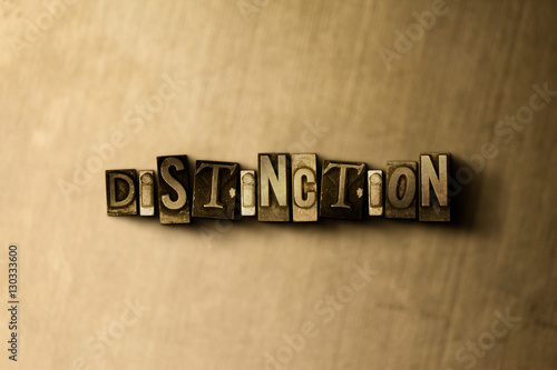 DISTINCTION - close-up of grungy vintage typeset word on metal backdrop. Royalty free stock illustration.  Can be used for online banner ads and direct mail.