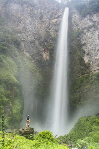 Tourist at 120m Sipisopiso Waterfall, Lake Toba (Danau Toba), North Sumatra, Indonesia photo