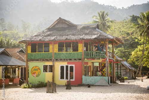 Rasta (Rastafarian) coloured beachfront accommodation at Sungai Pinang, near Padang in West Sumatra, Indonesia
