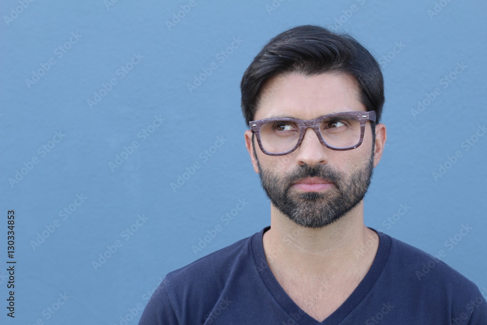 Man showing suspicion on his face Man showing suspicion on his face