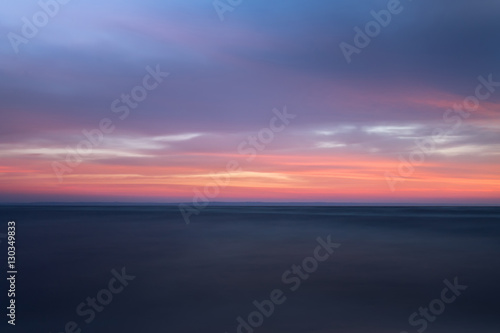 sunrise on the water / Early summer morning bright sky Beach