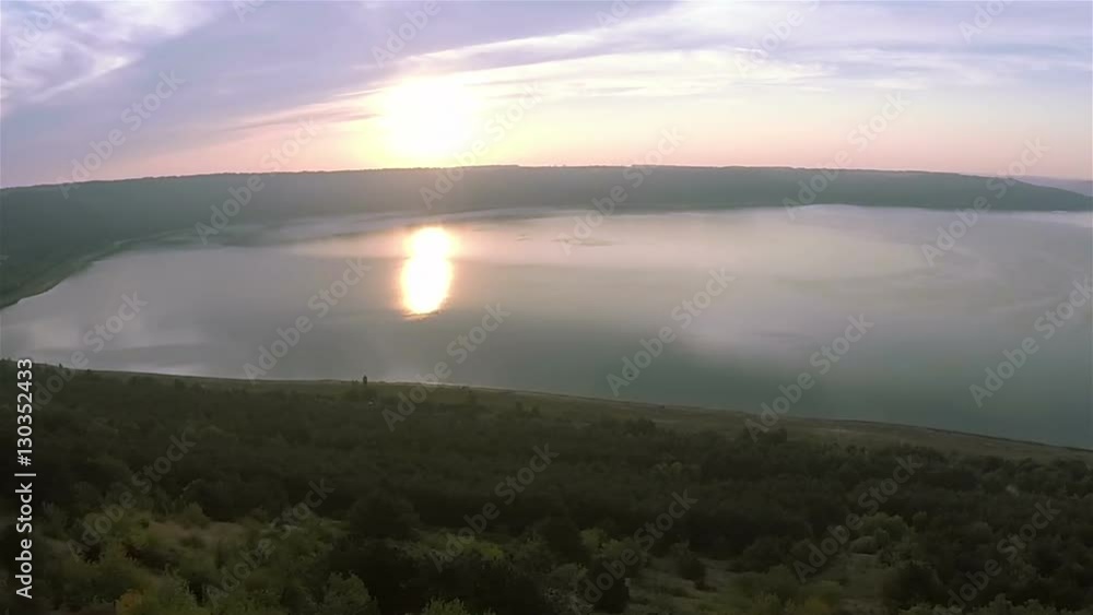 Aerial. Morning lake with reflection of sun in water .Panorama Aerial. Morning lake with reflection of sun in water .Panorama