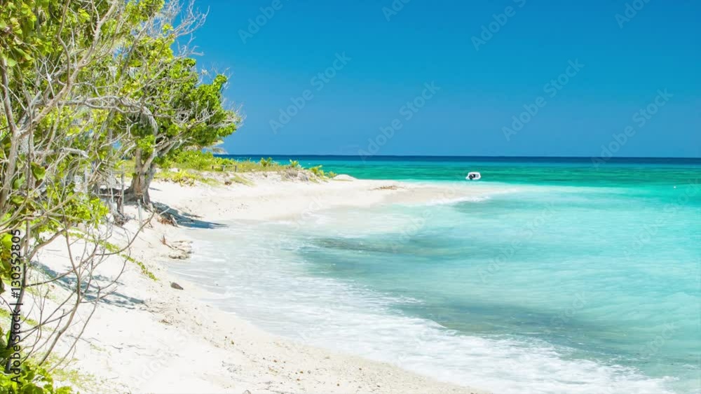 Secluded Private Exotic Beach on Mystery Island in Vanuatu with Shades of Tropical Blue Sea Water Breaking onto a Perfect Sandy Beach with Sunshine Weather Secluded Private Exotic Beach on Mystery Island in Vanuatu with Shades of Tropical Blue Sea Water Breaking onto a Perfect Sandy Beach with Sunshine Weather