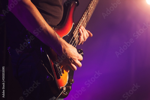 Rock bass guitar player hands