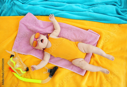 Cute baby with snorkeling m...