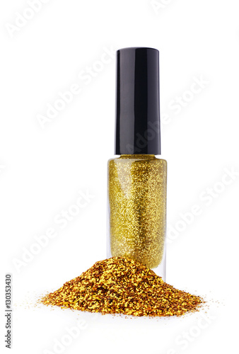 Golden nail polish with glitter