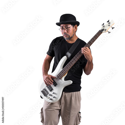 Studio portrait of senior man playing guitar on white background