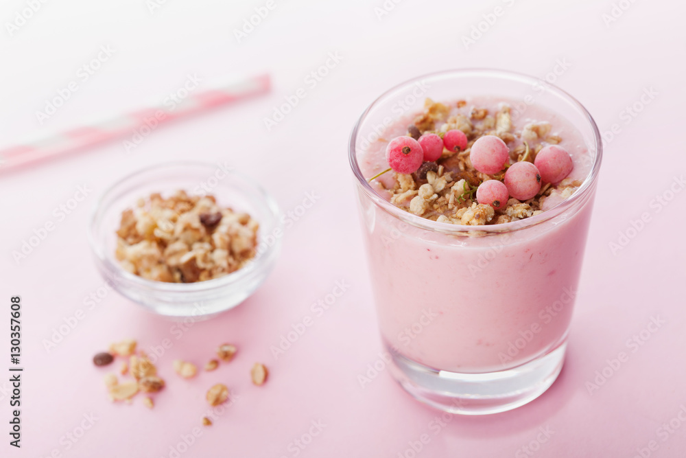 Berry smoothie or milkshake on pink table for healthy dessert, snack and breakfast. Berry smoothie or milkshake on pink table for healthy dessert, snack and breakfast.