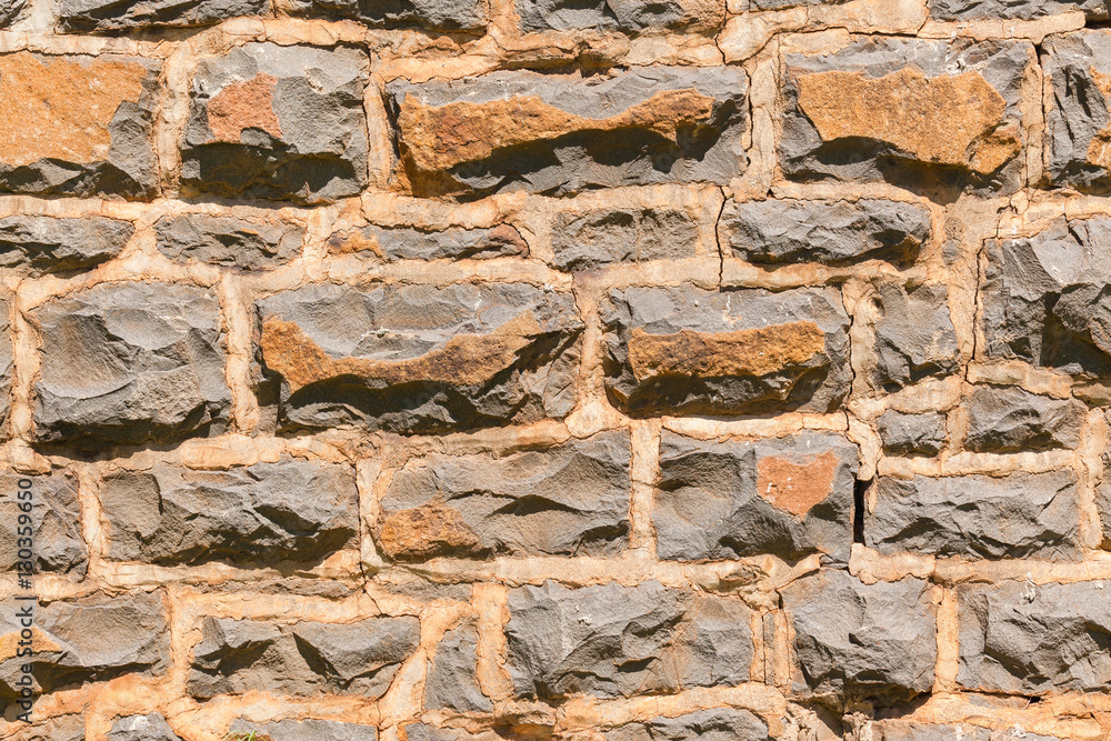 Fototapeta premium Wall Granite Stones closeup background detail textures.