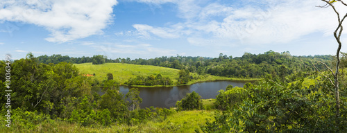 Panorama of Khoa Yai National Park.Blue sky clouds over tops of green trees

