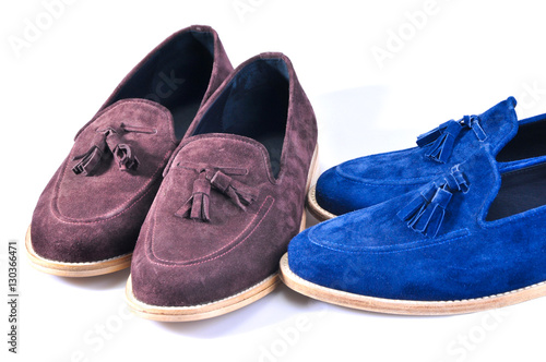 Men's leather loafers (moccasins) stylish blue and beige, two pairs shoes isolated on white background. Handmade Shoes