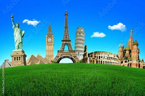 Fototapet Concept of travel. Green field with the wonders of the world.