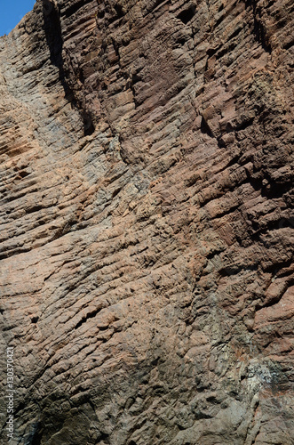 Basaltic wall of the coastal cliff